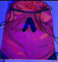 a red and blue drawstring bag with the letter a on it